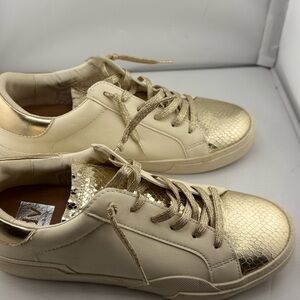 Dolce Vita Gold and Cream Sneakers with Metallic Toe Cap